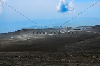 Dusty curvy road on Etna volcano, Sicily