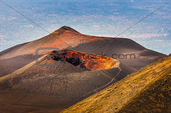 Colorful crater of Etna volcano with Catania in background, Sici