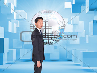 Composite image of businessman looking at camera