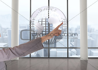 Composite image of smiling  businesswoman pointing