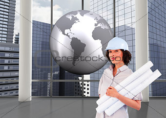 Composite image of woman holding construction plans