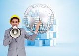Composite image of architect shouting with a megaphone