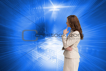 Composite image of profile view of businesswoman standing