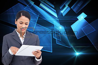 Composite image of close up of saleswoman with touch screen computer