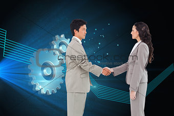 Composite image of side view of hand shaking partners
