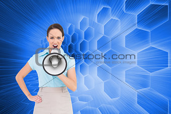 Composite image of furious businesswoman talking in megaphone