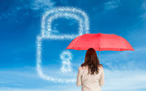 Composite image of businesswoman standing holding red umbrella