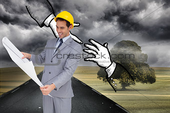 Composite image of architect with hard hat looking at plans