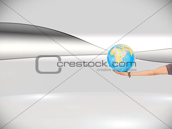 Composite image of man holding a globe