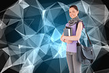 Composite image of student holding books and her bag while standing