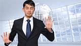 Composite image of businessman touching