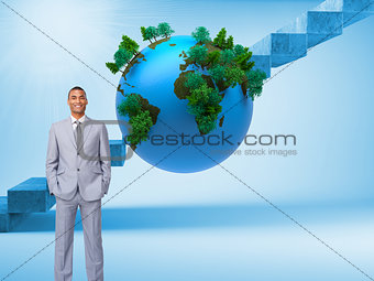 Composite image of businessman with hands in pockets
