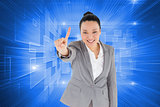 Composite image of asian businesswoman pointing