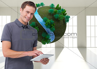 Composite image of young man with tablet computer