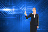 Composite image of young businesswoman pointing