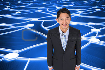 Composite image of smiling businessman