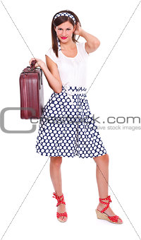Woman holding suitcase
