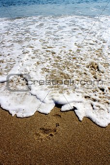 Footprint washed by tide