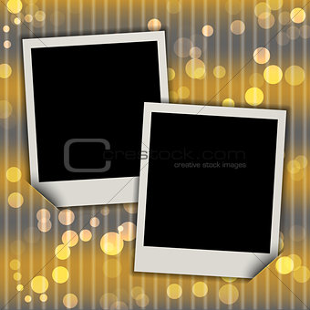 Two blank photo frames on festive bokeh background