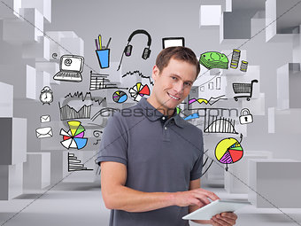 Composite image of smiling young man with tablet computer