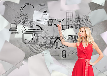 Composite image of elegant blonde standing pointing
