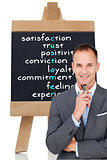 Composite image of smiling businessman holding glasses 