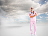 Composite image of beautiful nurse standing in front of the came
