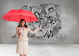 Composite image of happy businesswoman holding umbrella