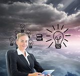 Composite image of businesswoman sitting on swivel chair with ta