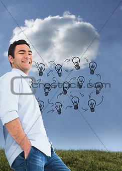 Composite image of smiling casual man standing