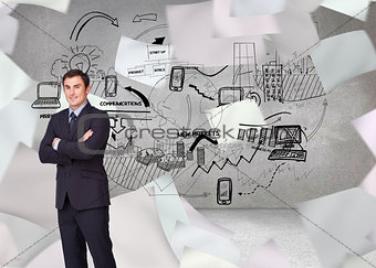 Composite image of young businessman standing cross-armed
