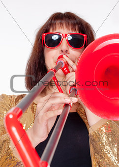 Young Female Musician Playing Trombone