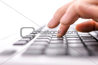 Business woman typing on keyboard