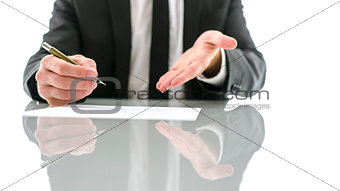 Businessman inviting you to sign a contract