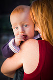 Cute Red Head Infant Boy Portrait with His Mother