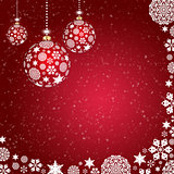 Christmas balls of snowflakes on a red background