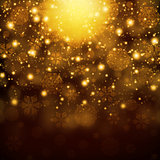 Snowflakes on abstract gold background