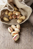 roasted and salted pistachios pour out of the bag