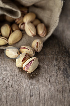 roasted and salted pistachios pour out of the bag