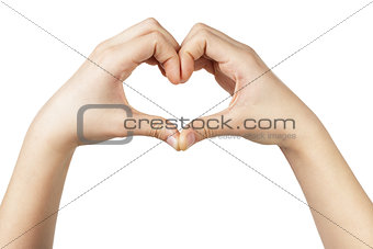 female teen hand makes heart shape with hands