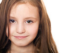 Closeup portrait of pretty little girl. Isolated
