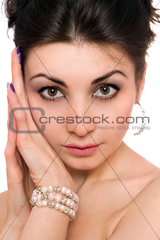 Closeup portrait of lovely young brunette. Isolated