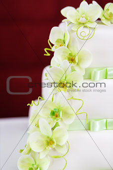 Wedding cake detail with orchid flowers