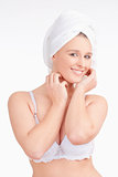 Beautiful Young Woman with Towel on her Head Smiling 