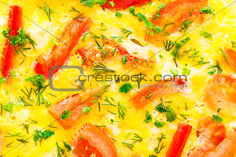 Omelet with paprika, tomato and herbs