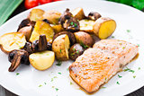 Roasted salmon with potatoes and mushrooms