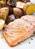Roasted salmon with potatoes and mushrooms