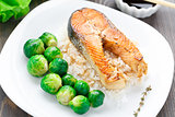 Fried salmon with rice and brussels sprouts