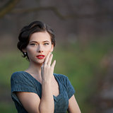 fashionable woman with retro coiffure