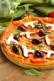 pizza with olives and mushrooms